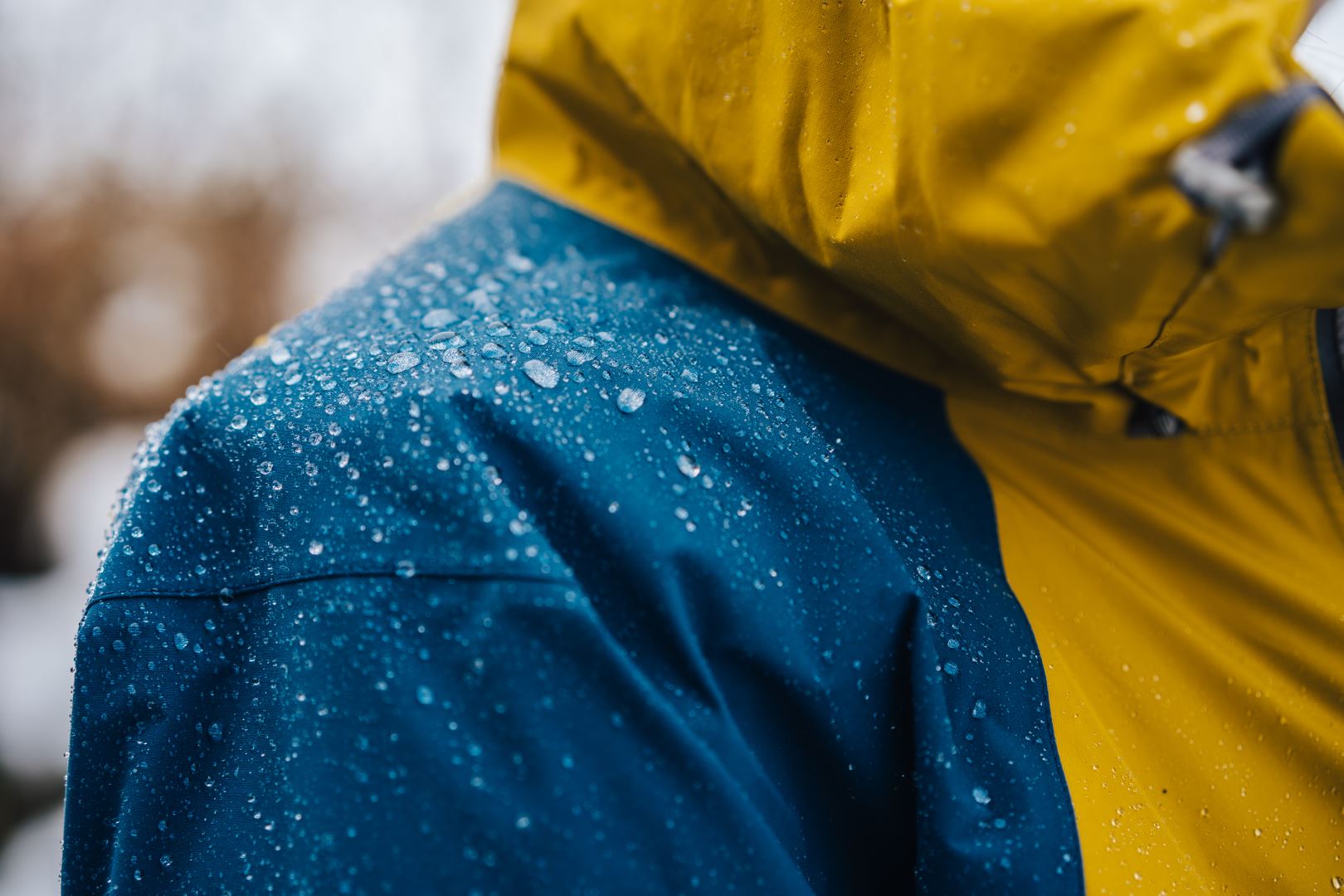 Water drops or droplets on a wooterproof gore-tex jacket.